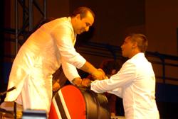 Legendary Pakistani artiste, Rahat Nusrat Fateh Ali Khan is presented with a steelpan, the national instrument of Trinidad and Tobago, by Randy Ramtahal, a director on the TSTT Board of Directors, at the Centre of Excellence, Macoya, on May 14