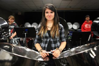 adaly Marchi of Holly poses for a portrait at Mott Community College in Flint. Marchi is a steel drum band member at Mott Alternative High School and this is her fourth year in the Mott Middle College program