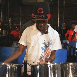 A young member of the CASYM steel drum orchestra