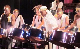 University of the West Indies Panoriddim Steel Orchestra plays a song during Panfest 2013 at The Philip Sherlock Centre for the Creative Arts