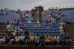 An audience sits in the Clio Amphitheater awaiting the start of the The Fabulous Oldies But Goodies, a favorite 50's & 60's band of The National Hot Rod Association, in Clio on July 29, 2014.