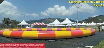 Workers set up bleacher facilities at the Queen’s park Savanna, Port-of-Spain, yesterday, in preparation for this weekend’s PanTrinbago National Panorama Semi-finals. However, a plan to use a pool (inset) as part of the attraction in the The Greens which has incensed panmen