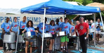 Christiana High School Steel Drum Band with Harvey Price (right, front), Founder, Peace Drums Project.