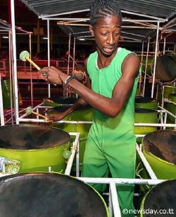 Like Nello: Pan Elders players, including this intense young man, wore jump-suits, the signature style of Lord Nelson for their performance of his 'All Ah We Is One Family' in the medium band category of the Panorama finals at Queen's Park Savannah, Port-of-Spain, on Saturday night.