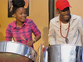 Pan twin siblings Deja and Dejean Cain thrill their Newtown Playboyz audience