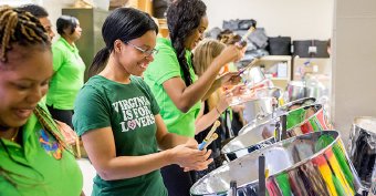 When practicing with [Skiffle], my playing is more relaxed, which helps me to articulate the notes better, says Brea Marshall 17 (center) of Sweet Briars Skiffle USA.