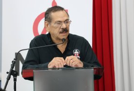 Professor Clement Imbert, MIC chairman welcomes the audience at the launch of the customised steelpan manufacturing programme for NGC