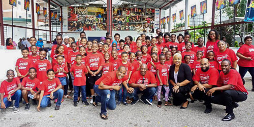 HADCO Phase II Pan Groove Junior Steel Orchestra with principals Akua Leith from front right, Andrew Charles, Desiree Myers, Len”Boogsie” Sharpe and Terry Bernard