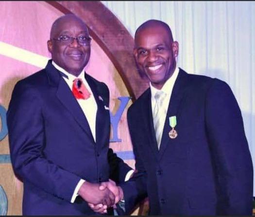 Duvone Stewart, right - recipient of The Tobago Medal of Honour - Gold
