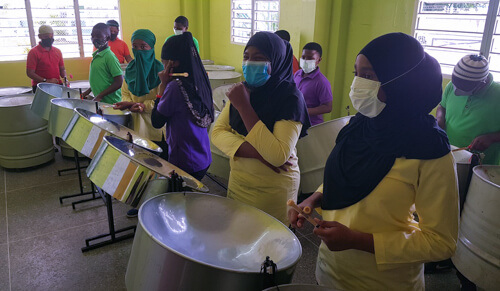 Students of Madressa Al Muslimeen Primary School with their  steel pans.
