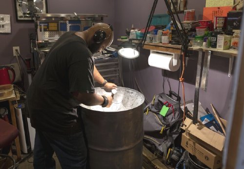 Keith Moone works on a steel drum Friday, Oct. 8, 2021, at the Mannette Musical Instruments workshop in Osage, W.Va.