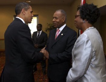 President Barack Obama meets with Prime Minister Patrick Manning and wife Hazel Manning