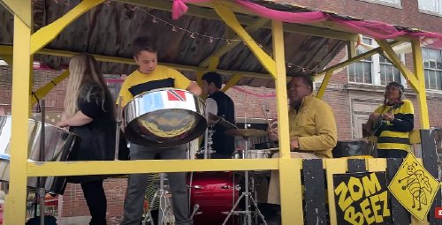 Honeybee Steelband plays music on Halloween in Montpelier on Monday