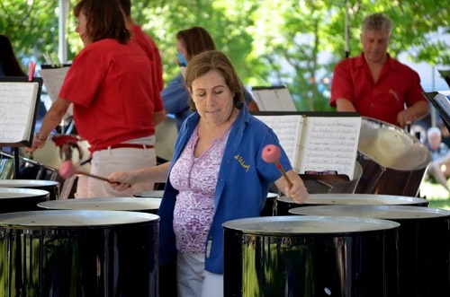 Members of the Steel Alchemy Drum Band are seen performing during a past Geneseo Rotary Summer Festival.