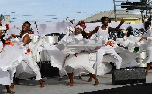 Swirling Moves: Dancers from North West Laventille Cultural Movement perform for guests during yesterday’s opening of the Witco Desperadoes Pan Theatre at George Street, Port of Spain