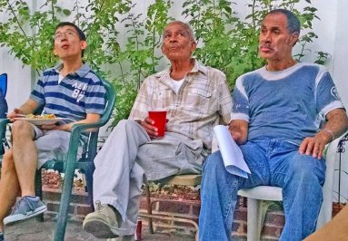With live pan playing in his Brooklyn backyard, “Caldera” Caraballo (center) hosted friends and family members on Labor Day Monday in 2015