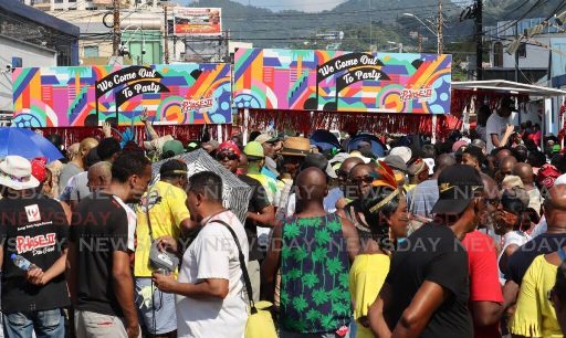 Revellers enjoy the First Jam J'Ouvert hosted by Shell Invaders in Woodbrook on Sunday