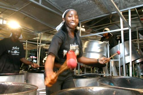 A steelpan player performs during a national band competition in Port of Spain, Trinidad. The instrument’s bright sound is attracting new fans at a rapid pace. Women are also now allowed to play the “pan.”