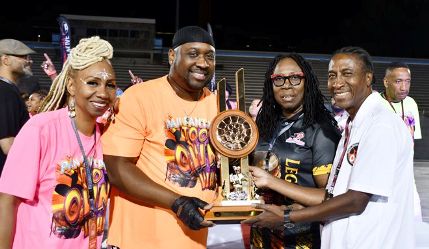 Left to right - Wendy Jones, Al Foster, Beverley Ramsey-Moore and Terrance Wilson with the new trophy provided by Pan Trinbago