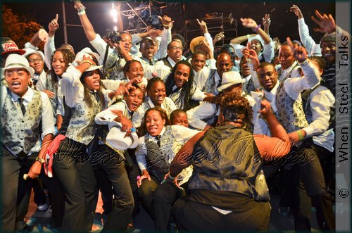 Members of ADLIB Steel Orchestra celebrate their 2011 NY Panorama championship on the stage