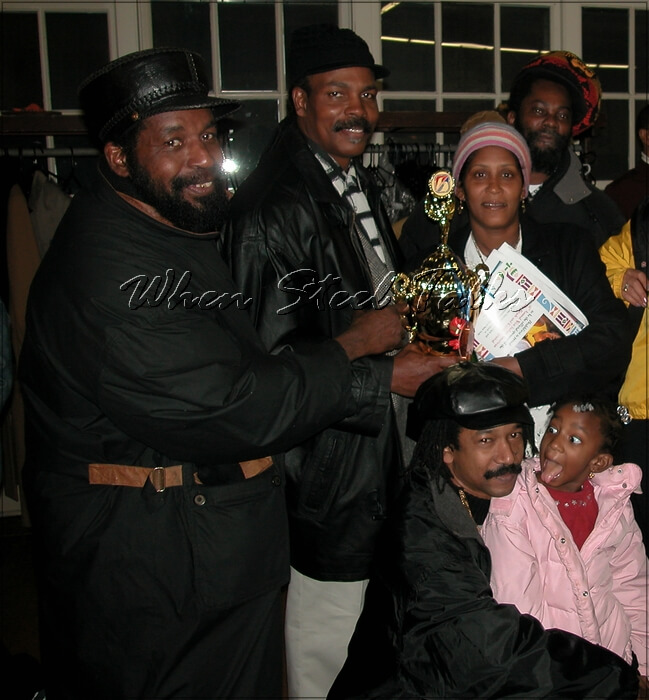 Ingrid Samuel (second from right) at a steelband award ceremony