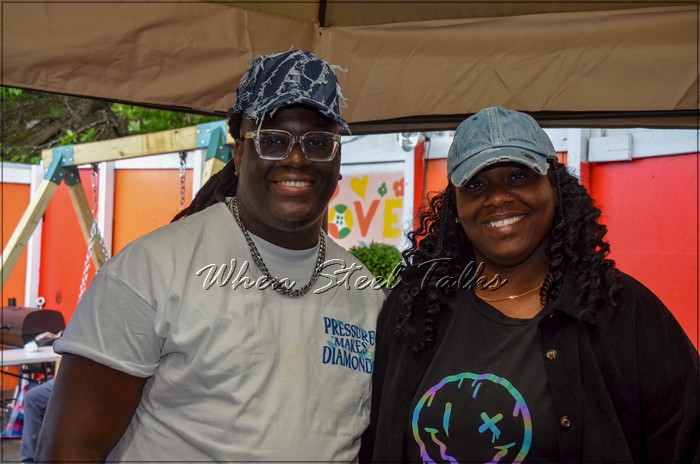 Joshua Bedeau with Vanessa Headley-Brewster in Metro Steel Orchestra’s panyard